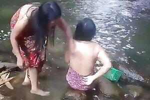 Beautiful girls having tub alfresco